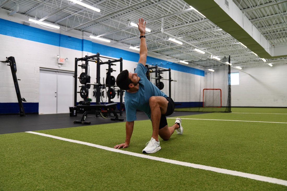 Dr. Pete Grasso demonstrating a mobility exercise
