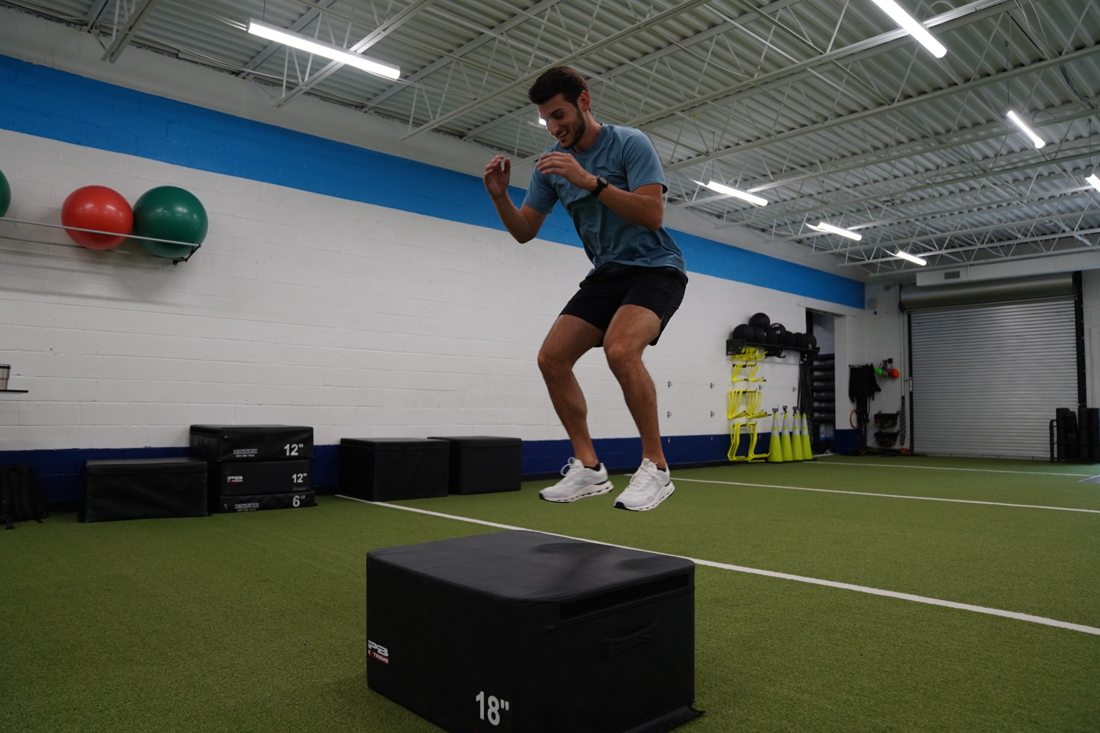 Dr. Pete Grasso performing a plyometric box jump